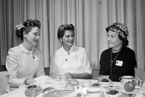 Members of the Who's New Club, an organization for all new women residents of Madison, open the fall season with a "get acquainted" luncheon at the Cuba Club. Left to right are: Mrs. J.B. Millbanks, Doreen Ryan, and Arlene Black.