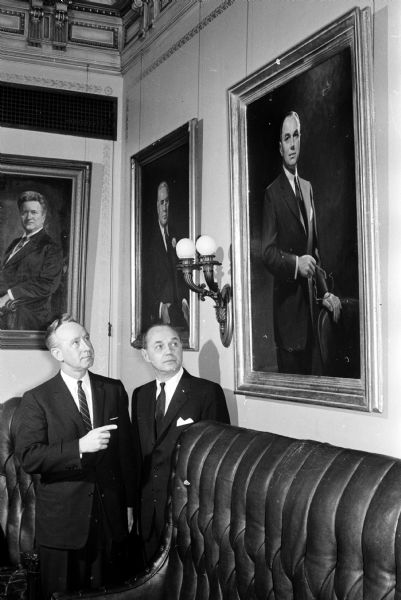 Governor Kohler Portrait Unveiled Governor Vernon Thomson (left) and former Governor Walter J. Kohler Jr. examine the oil portrait of Kohler which was unveiled in the Governor's private office at a brief ceremony. The portrait, painted by Bradshaw Crandell of New York was hung beside the portrait of Kohler's father, Walter J. Kohler Sr., who was also governor in 1929 and 1930.