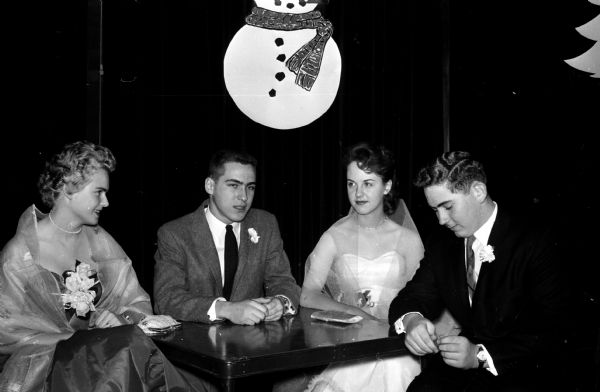 Elks Youth Dance A record number of 216 youths attended the third annual holiday formal held for teenage sons and daughters of Elks Club members and their guests. From left to right, attendees include Kathy Halles, Doug Wenger, Sally Platt and Bill Farman.