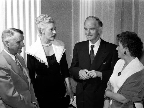 Among the attendees at the 50th anniversary meeting of the Dane County chapter of the American Red Cross are, left to right, Supreme Court Justice Timothy Brown and his wife, Louise, John Warren, and Mabel Huffman.