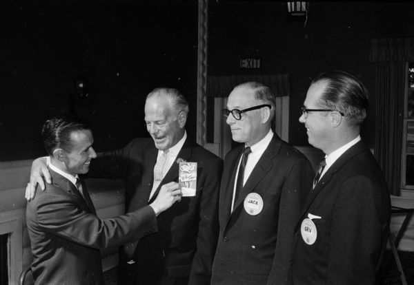 Attendees at the Salesman Awards Banquet include Rodney W. Korf (left), 4245 Mohawk Drive, a member of the awards committee, with R. Gilbert Stephan, 401 Eugenia Avenue, Jack Aycock, 1215 Wellesley Road and Orville C. Akre (far right), 4009 Duke Street, the new president of the club.