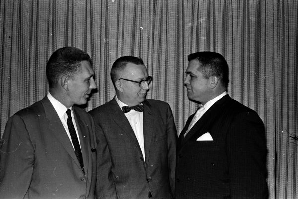 Prof. Verner Suomi Talks at First Annual Eagle Scout Recognition Banquet Prof. Verner E. Suomi speaks on the building and launching of weather satellites at the first annual Eagle Scout recognition banquet at the Madison Elk's Club. Shown (left to right) are: Fred Leach, program chairman; Prof. Suomi; and Arlie Mucks, Jr., toastmaster.