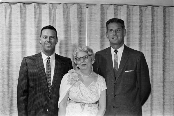 Goodman's Empty Stocking Christmas Party Robert Goodman, left, and Irwin Goodman, right, are shown with their mother Belle Goodman, during a Christmas party thrown for the employees of Goodman Jewelers. The Goodman brothers turned over a $100 check for the Empty Stocking Club which provides toys for children.