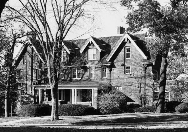 John M. Olin House Exterior view of the John M. Olin House, 130 North Prospect Avenue, University Heights neighborhood. The house, which displays traditional Gothic lines and was designed by the architectural firm of Ferry & Clas, is the home of the chancellor of the University of Wisconsin-Madison.