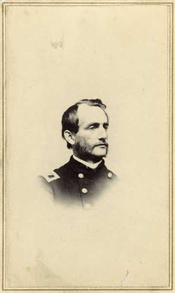 Vignetted carte-de-visite portrait of Colonel Lucius Fairchild in Madison, probably after the loss of his arm at Gettysburg. This portrait can be dated as no later than mid-1864 because that is the time in which photographer Fuller left Madison.