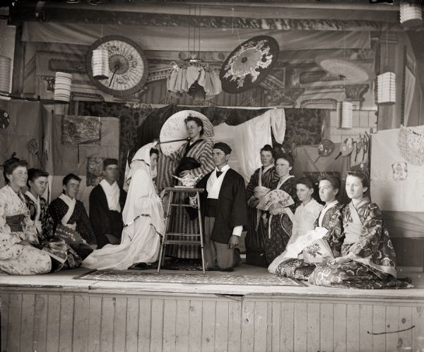 Local actors portray a Japanese wedding. The photographer's wife, Ada Bass, had a leading role in the production.
