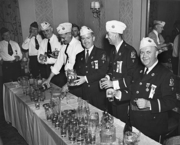 A gathering of officers and members of the Wisconsin Department of the American Legion, probably at their annual state convention. In Wisconsin the ardent patrioism of the American Legion provided a receptive audience for the anti-Communist message of Senator Joseph R. McCarthy.