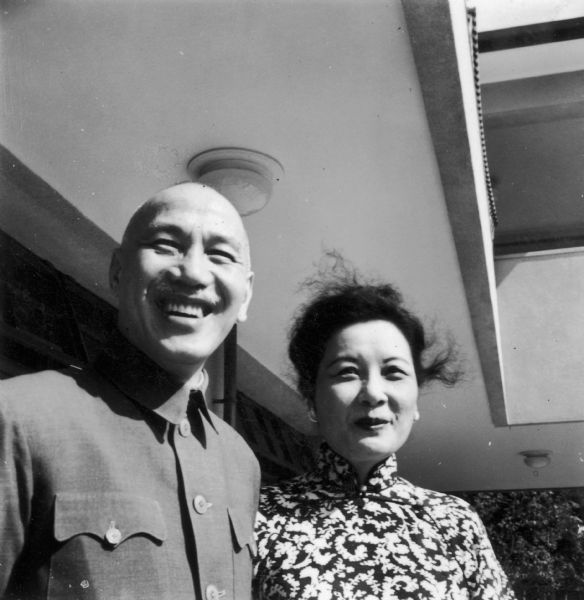 Snapshot of Chiang Kai-Shek and Madam Chiang Kai-Shek as they greet American reporters at their home in Taipei, only a few months after fleeing Mainland China.