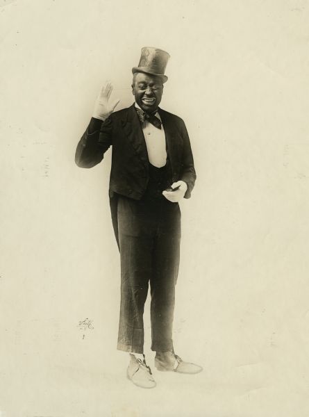 White Studio portrait of vaudevillian Bert Williams.