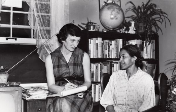 Rosa Parks being interviewed by Mrs. Anne Braden, editor of the "Southern Patriot," at Braden's home.