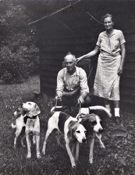 Perry and Elsie Horton, parents of Myles Horton, with fox hounds, at Highlander Folk School.
