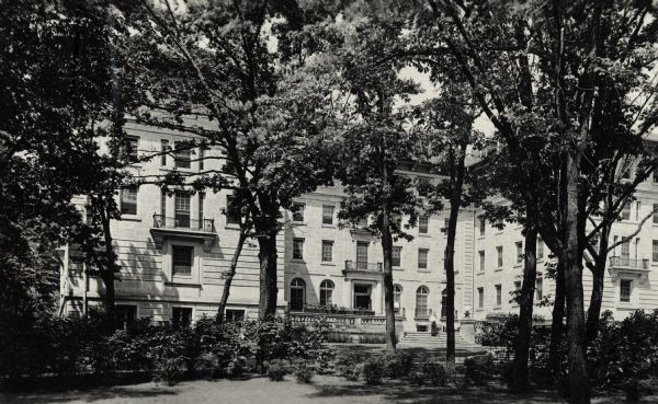 Barnard Hall Exterior of Barnard Hall building on University of Wisconsin-Madison campus. It features a flight of steps up to the entrance which is flanked by a stone railing. A note on the back of the image states that the women of Barnard Hall were petitioning the Board of Regents to establish a smoking room in the building for their comfort.