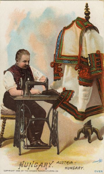 Chromolithograph card of a man in "native" Hungarian costume, posing with a Singer sewing machine and a large, decorative costume. Part of a "Costumes of All Nations," set created as a souvenir at the 1893 World's Columbian Exposition.