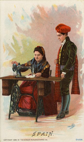 Chromolithograph card of an Spanish couple from Barcelona in "native" Barcelonian costume, posing next to a Singer sewing machine. Part of a "Costumes of All Nations," set created as a souvenir at the 1893 World's Columbian Exposition.