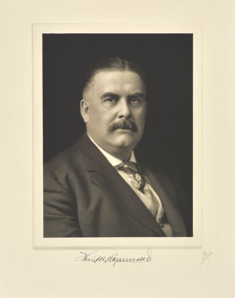 Quarter-length studio portrait of Theodore M. Hammond, Milwaukee publisher.