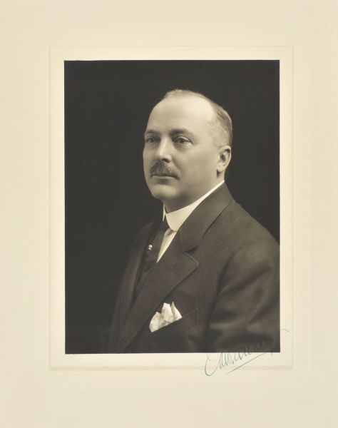Quarter-length studio portrait of Edward August Uhrig, Milwaukee company president.