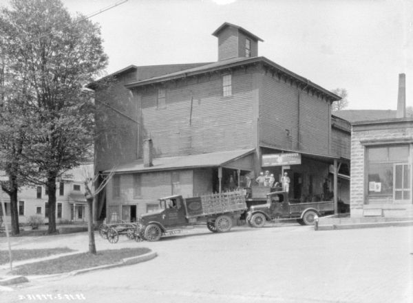 Group Of People In Front Of Dealership Photograph Wisconsin