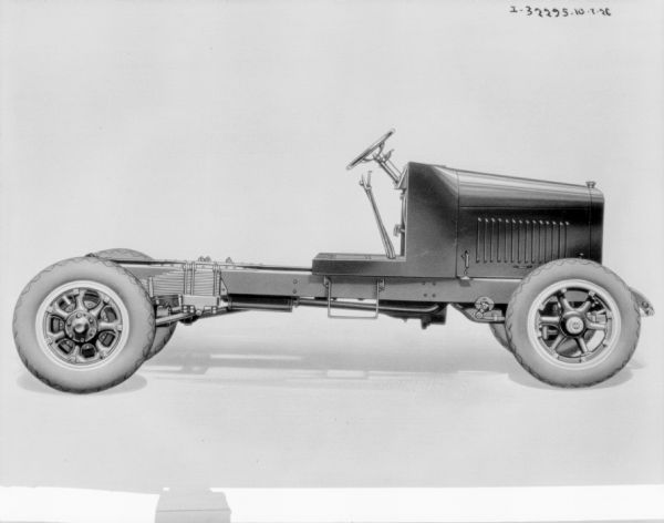 Truck View of right side of truck, with back chassis exposed.