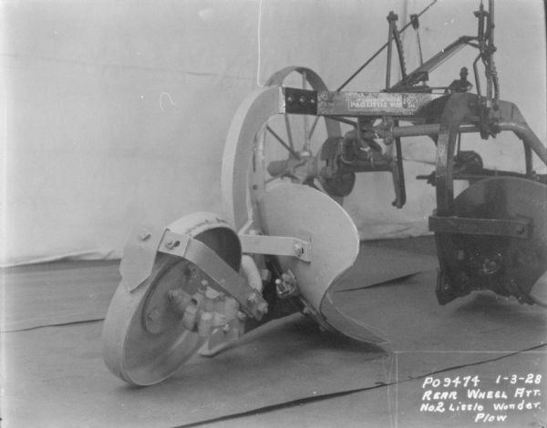 No. 2 Little Wonder Plow No. 2 Little Wonder Plow set up on factory floor. Rear wheel attached.