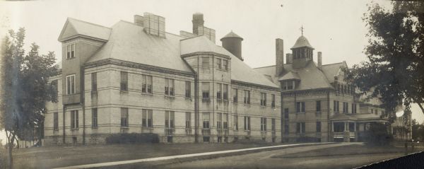 Exterior rear view of the Winnebago County Asylum building.