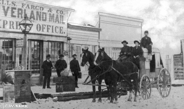 Men with a stagecoach in front of the Wells Fargo Mail and Express Company. In 1858, Wells Fargo helped start the Overland Mail Company, also known as the “Butterfield Line.”
