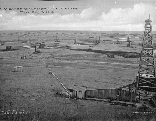 A vast oil field displays how Oklahoma became the the largest oil-producer in the country. Caption reads: "A View of Oklahoma Oil Fields, Tulsa, Okla."