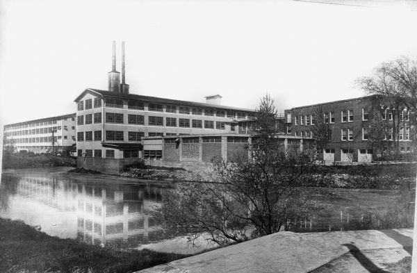 View across river of Woolens Mill.