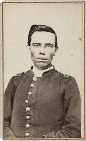Waist-up carte-de-visite portrait of William H. Harrison, Assistant Surgeon, F & S, 4th Wisconsin Cavalry.