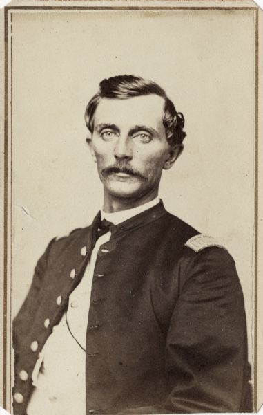 Waist-up carte-de-visite portrait of Captain Edwin D. Henry, Company B, 4th Wisconsin Cavalry.