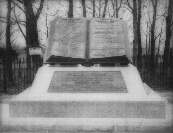 "Commands Honored" monument in the form of a large bronze book opened to pages reading "High Water Mark on the Rebellion" and "Repulse of Longstreet's Assault."