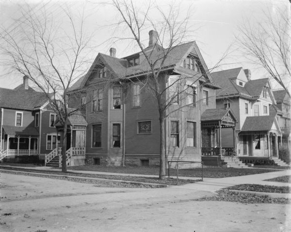 A two- and one-half story Queen Anne style house with stone foundation. This house was likely located at 203 Monana Avenue (Martin Luther King Blvd.) at the corner of Doty St.