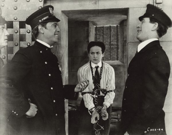 Harry Houdini in a scene from the silent motion picture, "The Grim Game."