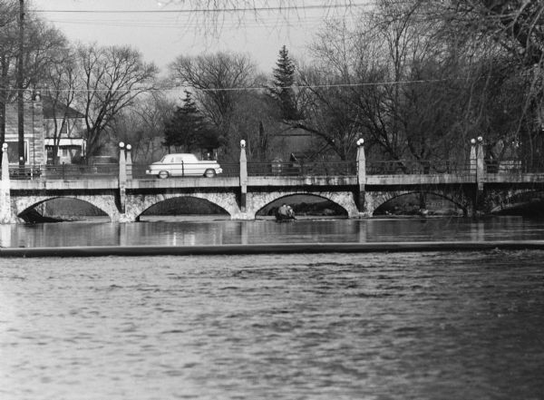 Bridge over Rock River "The wonderful old bridge." The bridge was built in 1874 by Frederick Fisher.