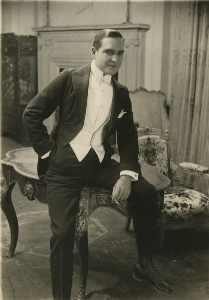 Earle Williams wears a white tie and tails for the title role in "Arsene Lupin."