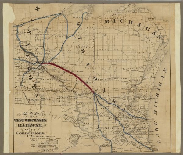Map of Wisconsin and portions of Minnesota, Michigan, Illinois and Iowa show the major railway tracks and their connections in red and blue ink. Lakes, rivers and some cities are marked. At the bottom left of the map is a table giving railway mileage distance between major cities such as Chicago and Madison.