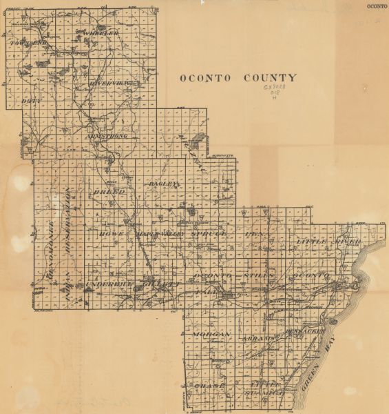 This map from the early to mid-20th century shows the township and range system, towns, cities and villages, roads, railroads, schools, churches, cemeteries, and lakes and streams in Oconto County, Wisconsin.
