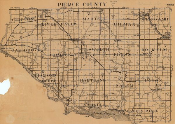This map of Pierce County, Wisconsin, from the first half of the 20th century, shows the township and range grid, towns, sections, villages, roads, railroads, schools, churches, cemeteries, town halls, and rivers and streams.