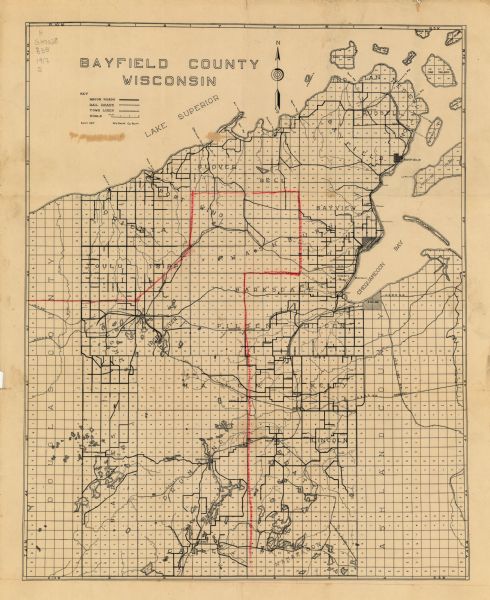 This 1917 map of Bayfield County, Wisconsin, shows the township and range system, towns, sections, cities and villages, railroads, wagon roads, and lakes and streams in the region.