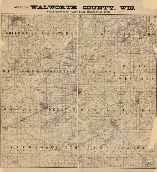 This 1900 map of Walworth County, Wisconsin, shows the township and range grid, towns, sections, landownership and acreages, rural residences, cities and villages, roads, railroads, and lakes and streams.
