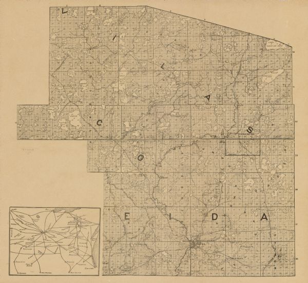 This mid 20th century map of Vilas County and northeastern Oneida County, Wisconsin, shows the township and range grid, sections, cities and villages, railroads, lakes and streams, and selected farms, resorts, camps, saw mills, etc. An inset shows the rail connections in Minnesota, Wisconsin, Iowa, and Illinois. The map is irregularly shaped.