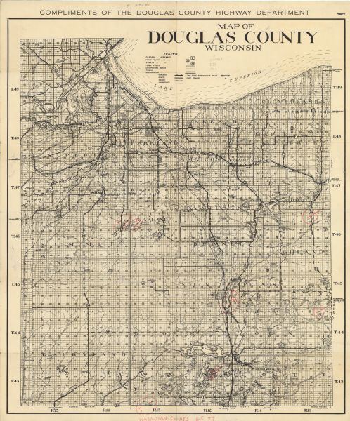 "Compliments of the Douglas County Highway Department"--Top margin.  Shows federal highways, state trunk highways, county highways, town roads, unimproved roads, trails, boundaries, low type bituminous roads, concrete, gravel, and graded roads, and fire towers. Includes manuscript annotations.