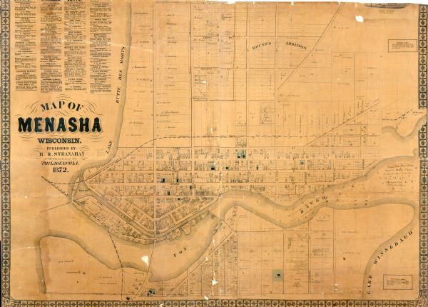 Shows landowners, buildings, lot numbers, roads and railroads. Includes Menasha business directory.