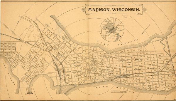 Shows ward divisions and street railways, as well as University of Wisconsin buildings, churches, and schools. Cataloged from copy with right and left edges trimmed off. Scale indicated by quarter mile circles from state capitol. Oriented with north to the upper right. Includes location map.