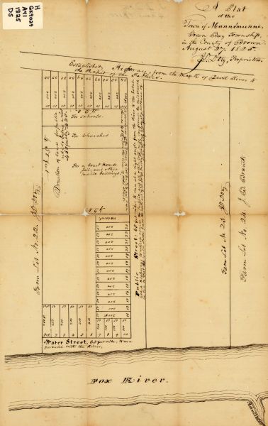 Map is ink on paper. Map shows plat of the town of Munnomunne, the Fox River, farm lots, and an established highway. The map is signed by "J.D. Doty, Proprietor."