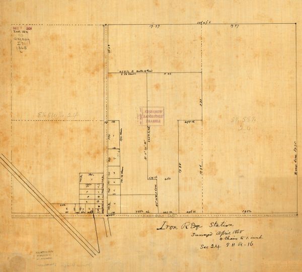 This map is ink on tracing cloth and shows lot and block numbers, depot, railroads and side tracks, and streets in sections 24 and 25, T.11, R.16E. The map shows Iron Ridge Station as surveyed in April of 1868.