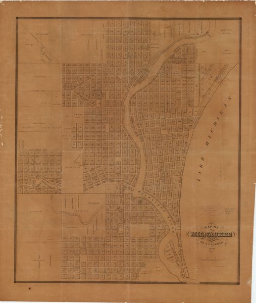 Map of Milwaukee This map shows lot and block numbers, roads, railroads, and some landowners’ names. Lake Michigan, the Milwaukee River, and the Menomonee River are labeled.