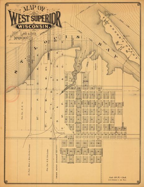 This map shows lot and block numbers, sold lots, established dock lines, docks, slips, railroads, industrial buildings, streets, and the St. Louis Bay.