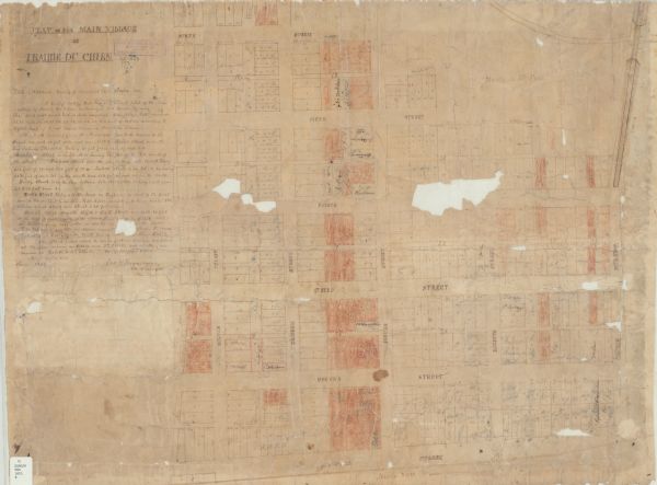 This map is ink, pencil, and color on paper and shows lot and block numbers and dimensions, sold lots, streets, and the Mississippi River. Some lots are colored brown and some have names written in, likely indicating ownership. The left margin includes certification inscribed by Ira. B. Brunson. The back of the map includes additional certifications.