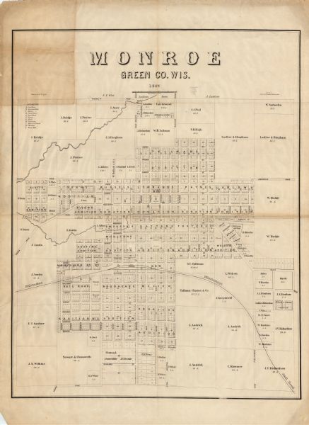 This map shows rural landownership and acreages, lot and block numbers, selected buildings, roads, railroads, and public squares. The map is indexed for the courthouse, hotels, a seminary, churches, and a steam mill. Also included is a second map that is hand-colored, includes manuscript notations, and just shows the main additions that are on the original map. Additions are colored in red, yellow, and blue. This map can be folded into booklet form and the verso reads: "Monroe, Green CO., Wis., 1857, Drawn by W.W. Card. Mounted September 1868, J.T. Dodge C.E."