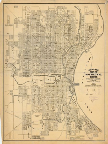 This map shows parks, block numbers, Lake Michigan, and railroads. Relief is shown by contours. Also included is an explanation that lists how many miles of streets were improved with wood, stone, brick, asphalt, McAdam, or gravel.